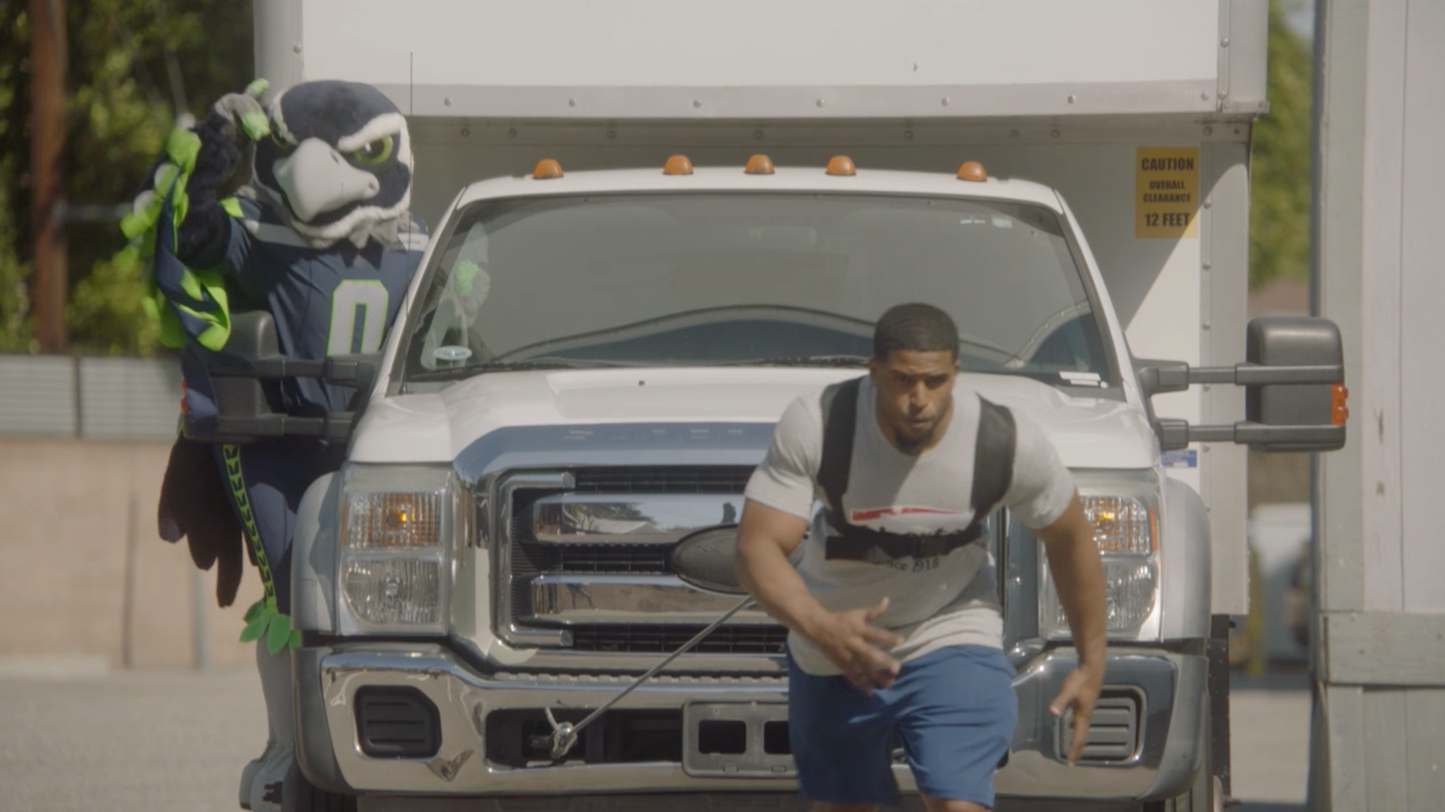 All-Pro Bobby Wagner Pulls Truck full of Pulled Pork Jerky 